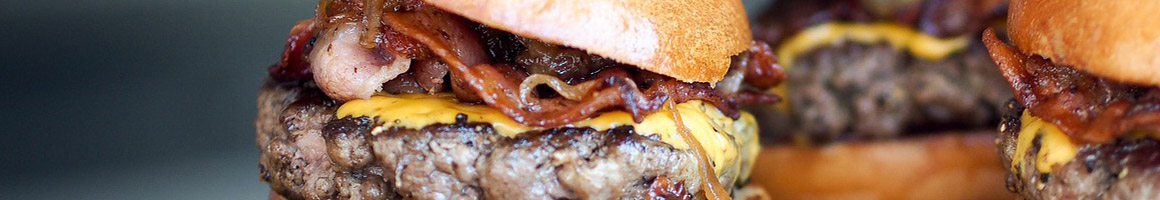 Eating Burger at Jaspers Café restaurant in Medford, OR.